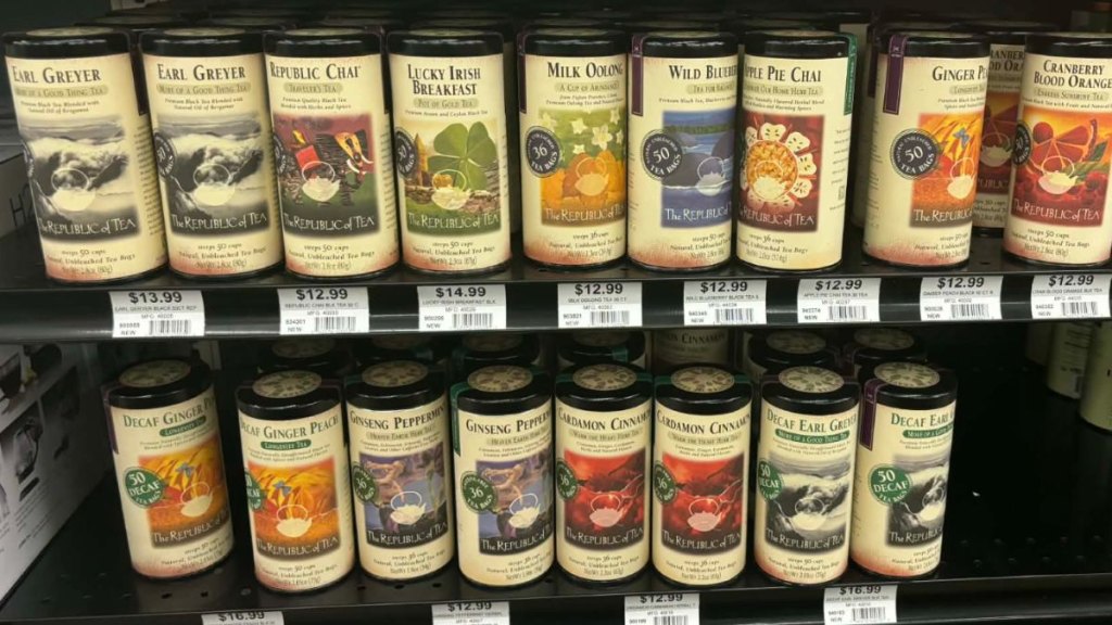 A shelf of colorful canisters of tea at Ace Hardware.