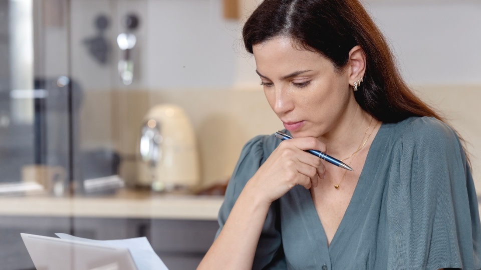 Woman reading papers