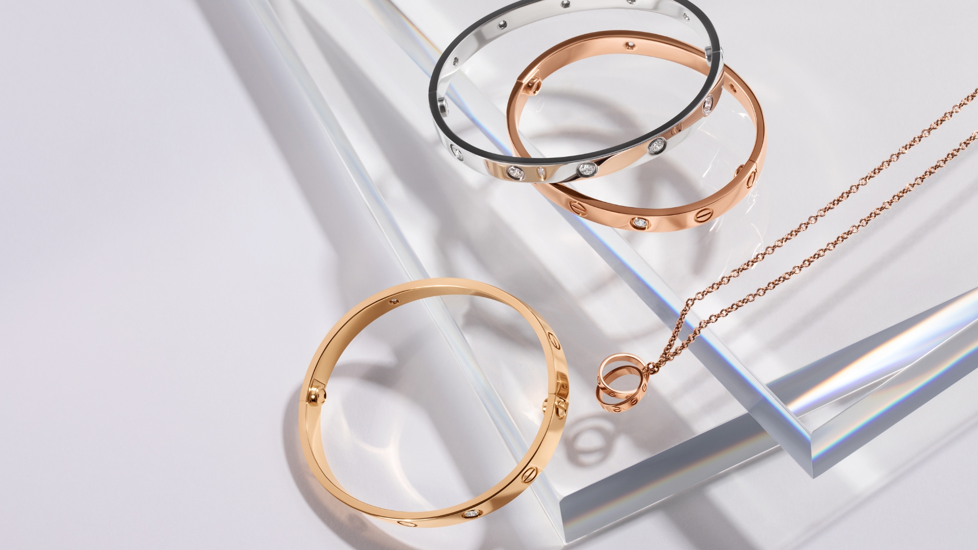 Luxury handbags and jewelry displayed as modern heirloom pieces for future generations.