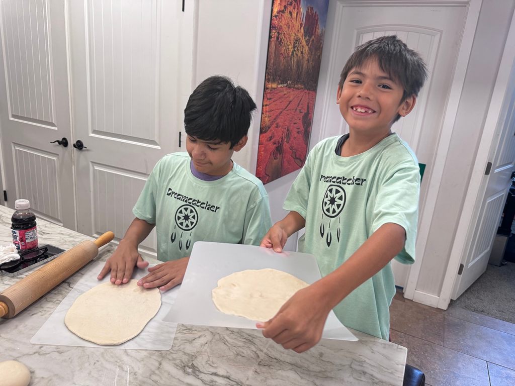 Elisia helps kiddos learn to make traditional foods like frybread