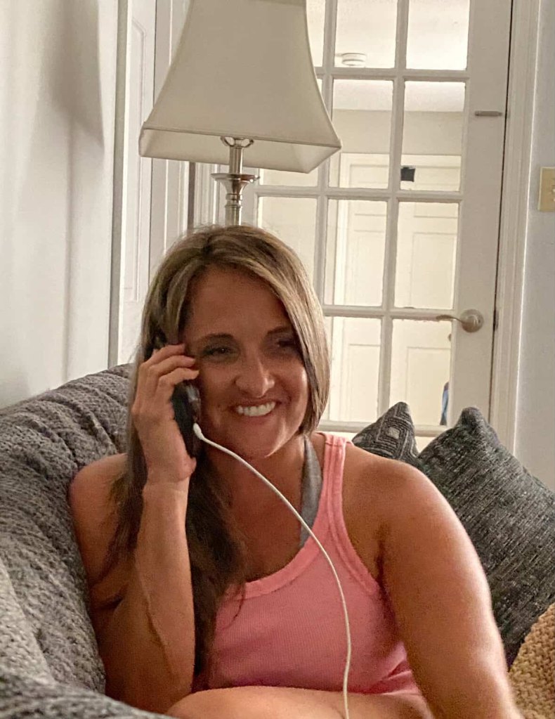 Jennifer talking on the phone with Paul for the first time