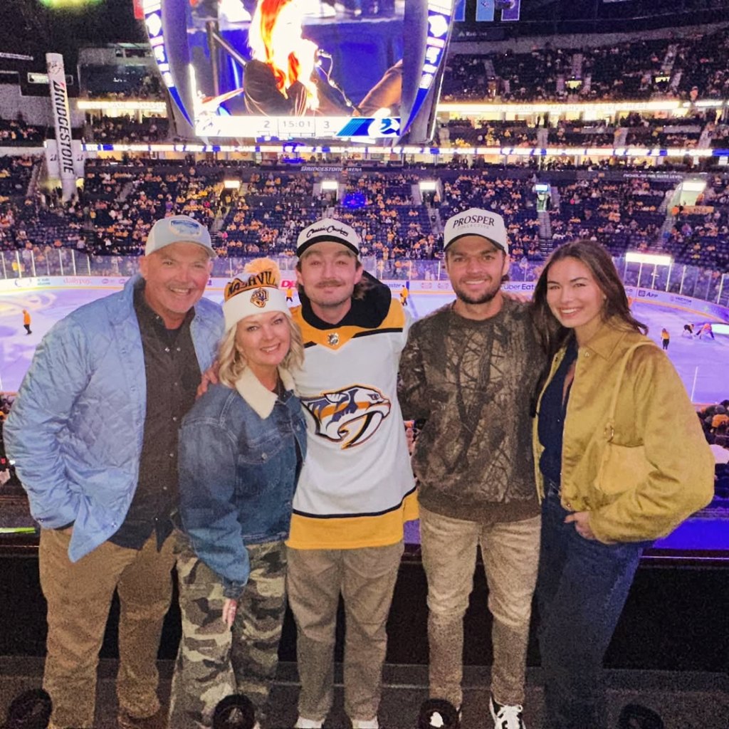 Jennifer with her husband, Marty, Cooper, Connor, and Connor's wife, Leah