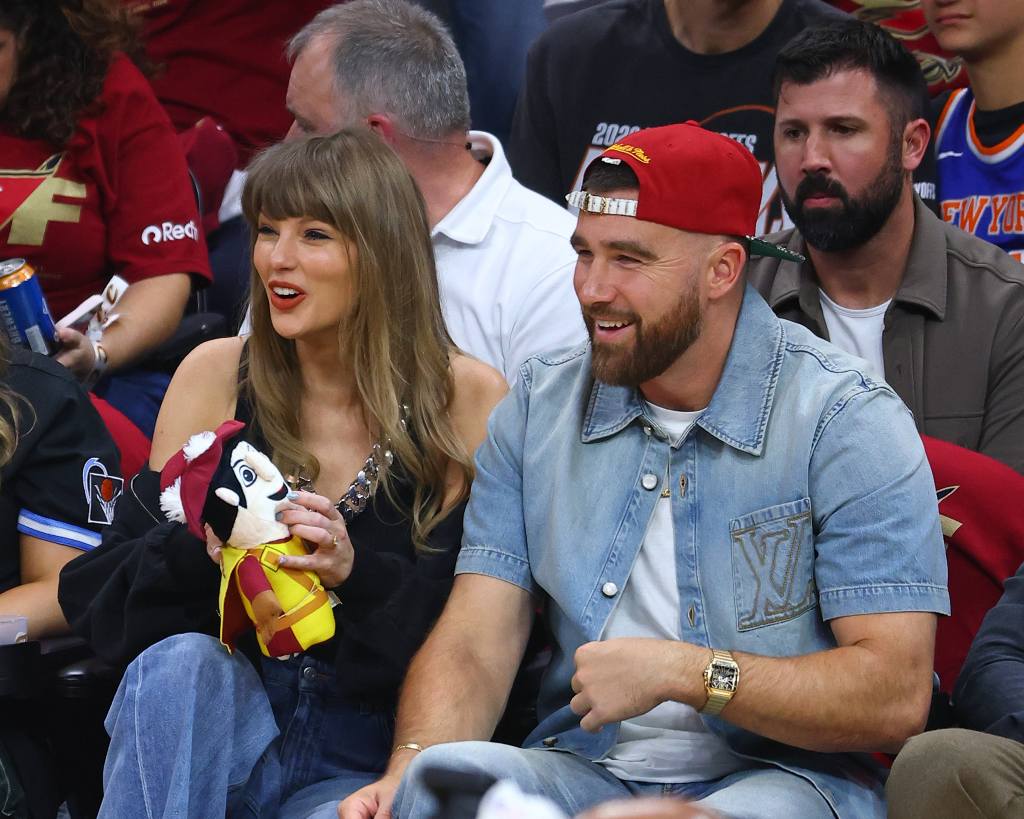 CLEVELAND, OH - MAY 23: Taylor Swift and Travis Kielce attend the game between the New York Knicks and Cleveland Cavaliers during Game Three of the 2026 Eastern Conference Finals on May 23, 2026 at Rocket Arena in Cleveland, Ohio. NOTE TO USER: User expressly acknowledges and agrees that, by downloading and/or using this Photograph, user is consenting to the terms and conditions of the Getty Images License Agreement. Mandatory Copyright Notice: Copyright 2026 NBAE (Photo by David L. Nemec/NBAE via Getty Images)