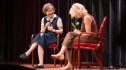 Ann Patchett laughs on stage, talking about books