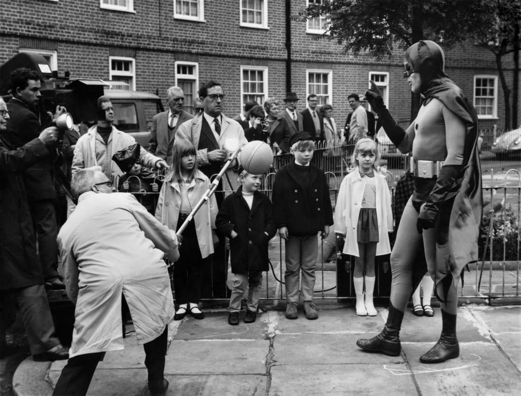 Original caption: Batman actor Adam West spent his first day in London - filming. This time for the Central Office of Information, after being asked to make a road safety film for British children. May 1967