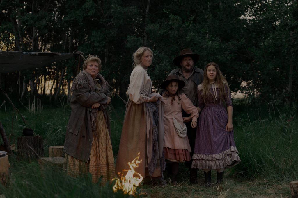 Alison Arngrim as Ida, Andrea Greening as Woman, Alice Halsey as Laura Ingalls, Aaron Merke as Harmonica Man, Skywalker Hughes as Mary Ingalls in 'Little House on the Prairie' (2026)