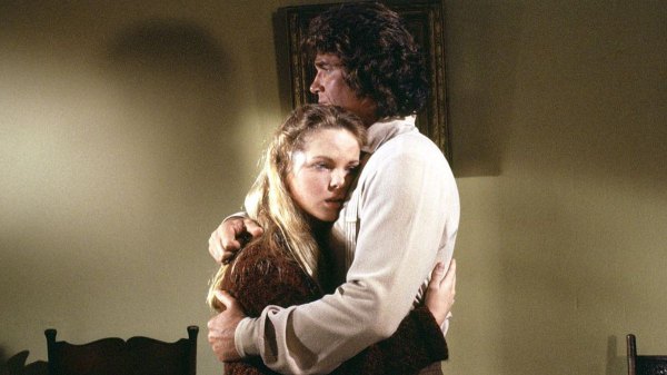 Mary and Pa embrace on the set of LIttle House on the Prairie