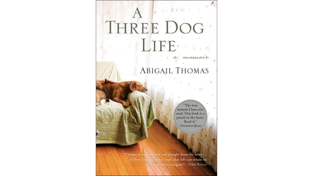 The book cover for 'A Three Dog Life'