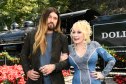 The Story Behind Billy Ray Cyrus and Dolly Parton's Friendship