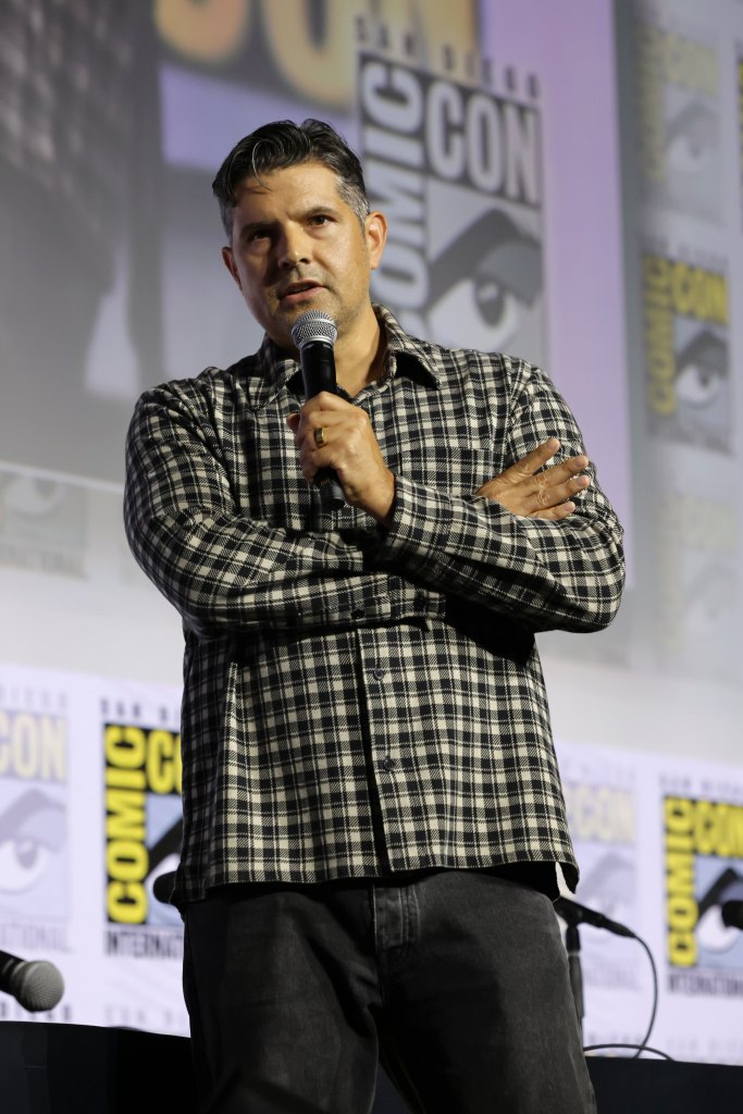 Graham Roland attends their panel for the upcoming Apple TV sci-fi drama series “Neuromancer” in Hall H at San Diego Comic Con at San Diego Convention Center on July 25, 2026 in San Diego, California.