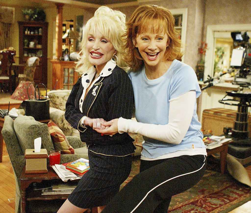 Dolly Parton and Reba McEntire on set of 'Reba,' 2005