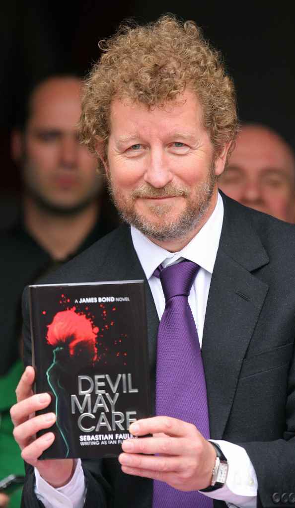 Author Sebastian Faulks takes receipt of one of the first copies of the new James Bond novel entitled 'Devil May Care'