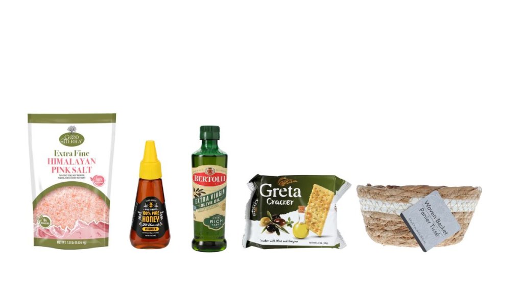 salt, honey, olive oil, crackers and a basket