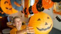 Woman decorating for Halloween