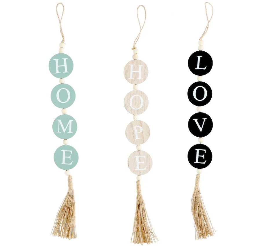 Dollar Tree hanging wooden wall decor that says LOVE, HOME, HOPE