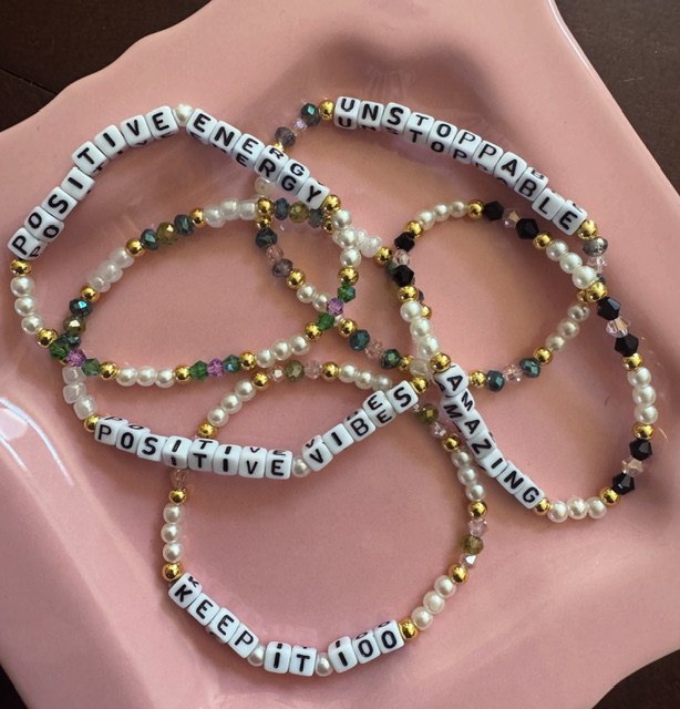 Boxed By an Angel includes handmade friendship bracelets in each box with encouraging words or phrases