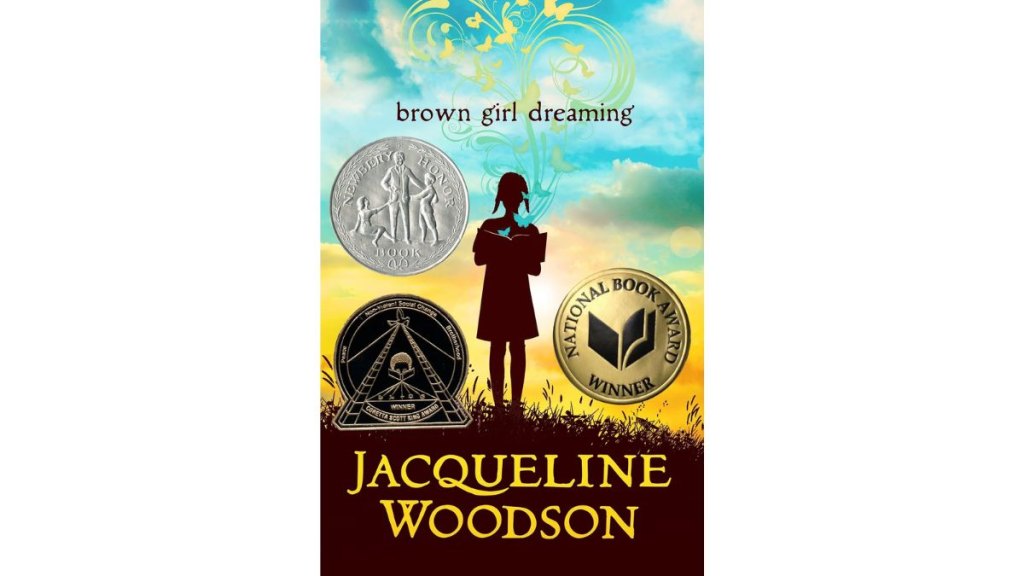 The book cover for 'Brown Girl Dreaming'
