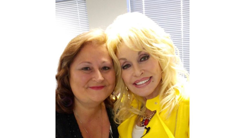 Deborah Evans Price and Dolly Parton in 2016