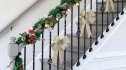 A Hallmark-movie-inspired room decorated with Dollar Tree garland and bows