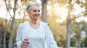 A woman walking to lower her high blood sugar levels