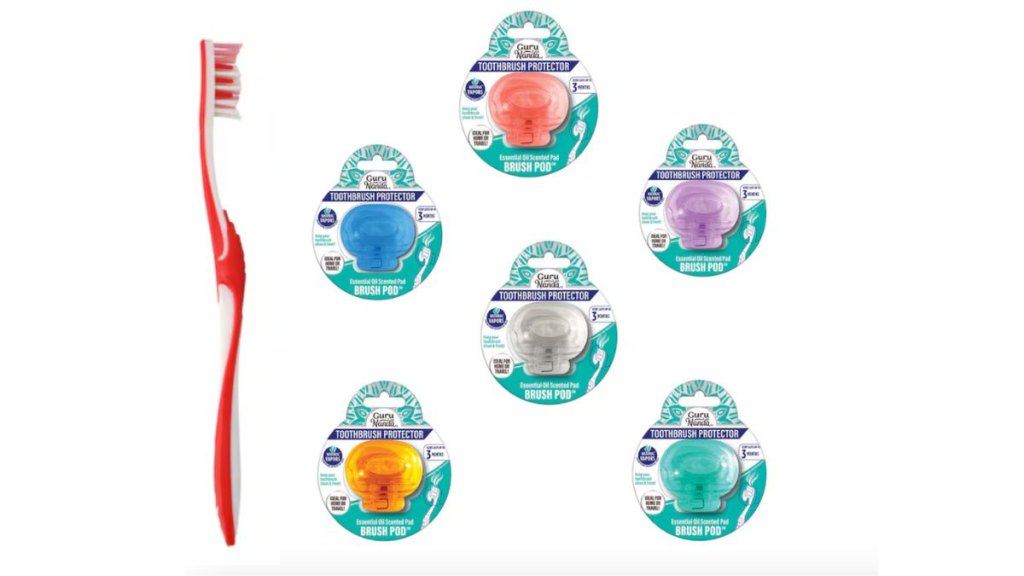 A toothbrush next to toothbrush storage pods from Dollar Tree