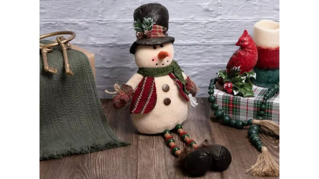 A snowman shelf sitter