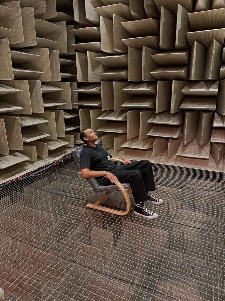 While doing research for Into the Quiet, John Mark visited the quietest place on earth/ an anechoic chamber at Microsoft at -20 decibels