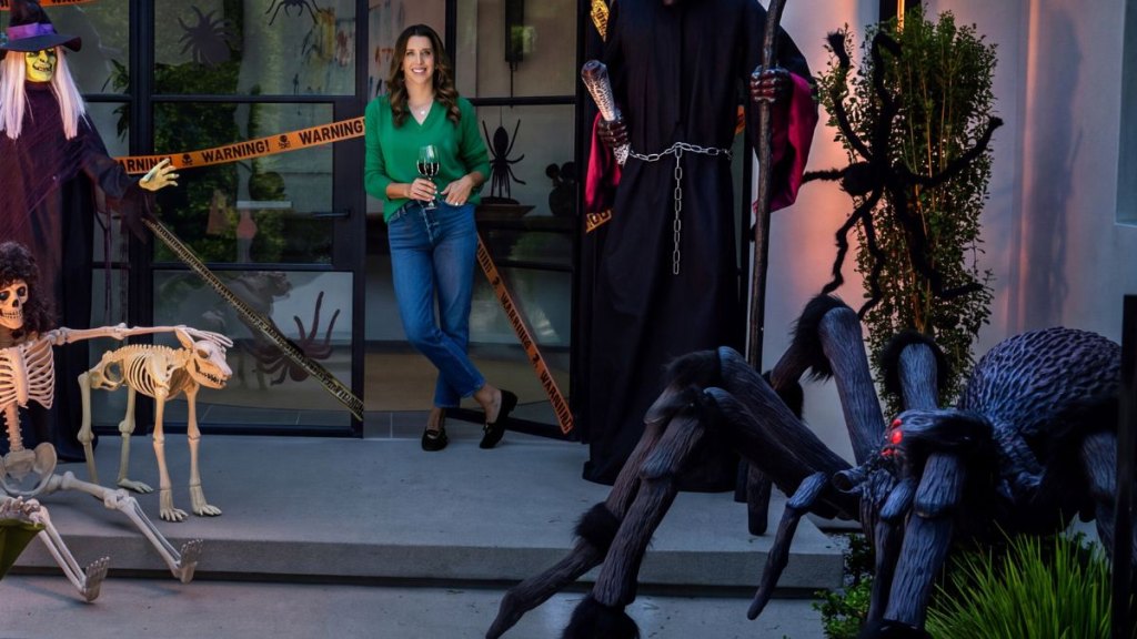 Kelly Senyei and her giant spider
