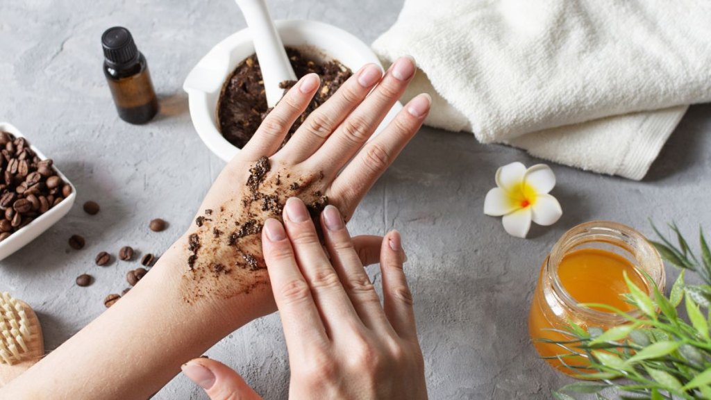Woman hands making peeling with homemade body scrub